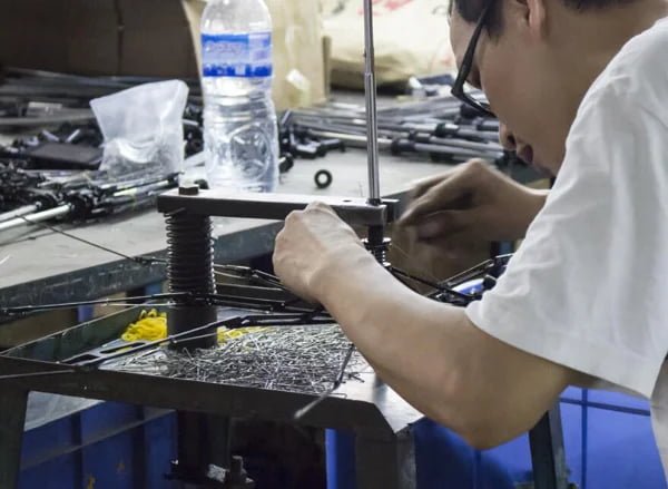 Umbrella frame manufacturing